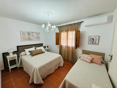 Cama o camas de una habitación en Dehesa La Parrilla - VUT- Eventos