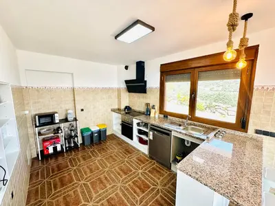 Una cocina o zona de cocina en Finca El Encinar- Casa Rural -Eventos