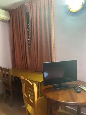 Una televisión o centro de entretenimiento en Hotel Cadalso - Casa Moncho