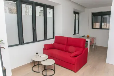 Zona de estar de Apartamentos ÍCARO