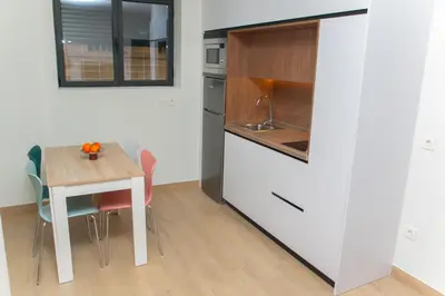 Una cocina o zona de cocina en Apartamentos ÍCARO
