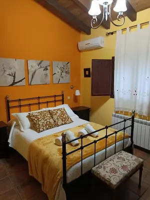 Cama o camas de una habitación en Villa Amanecer Candeleda