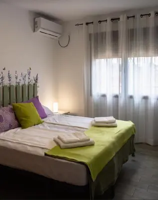 Cama o camas de una habitación en La Fragua del Sauce-VUT-Los Navalmorales-Toledo