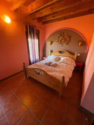 Cama o camas de una habitación en Casa rural el pozo