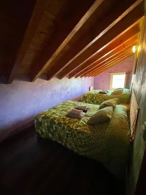 Cama o camas de una habitación en Casa rural el pozo