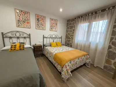 Cama o camas de una habitación en Casa Rural Tomillo