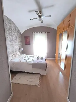 Cama o camas de una habitación en Apartamento El Olivar de Cáceres