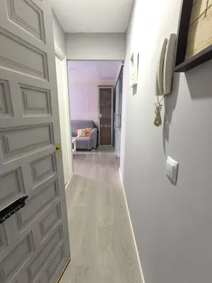 Una televisión o centro de entretenimiento en Apartamento El Olivar de Cáceres
