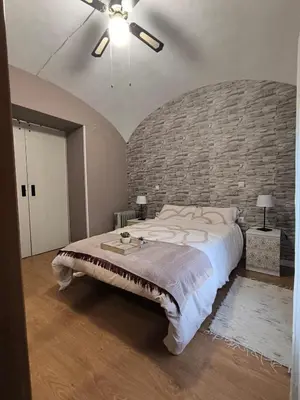 Cama o camas de una habitación en Apartamento El Olivar de Cáceres