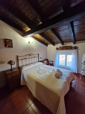 Cama o camas de una habitación en Casa Rural Era de los Trigales