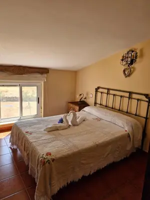 Cama o camas de una habitación en Casa Rural Era de los Trigales