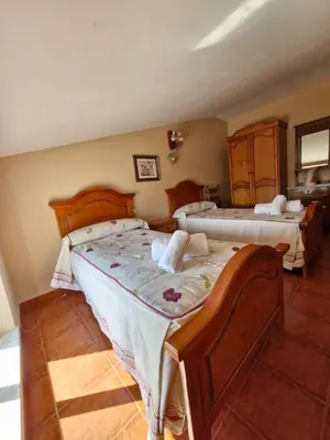 Cama o camas de una habitación en Casa Rural Era de los Trigales
