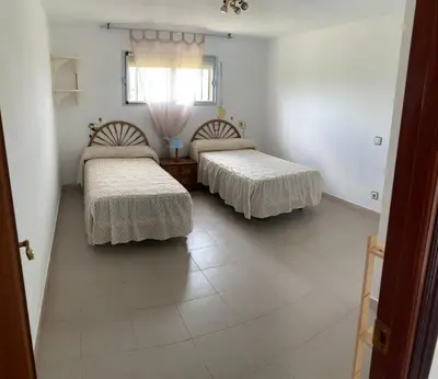 Cama o camas de una habitación en Casa familiar La Cabra