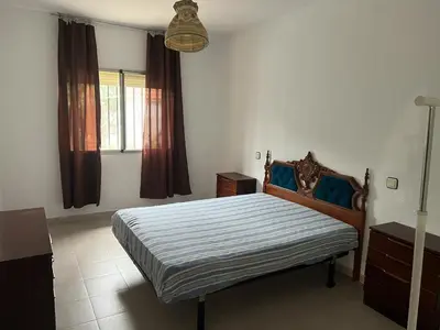 Cama o camas de una habitación en Casa familiar La Cabra