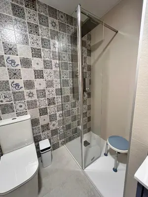 Un baño de One Apartamentos
