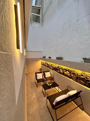 Zona de estar de One Apartamentos