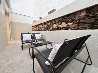 Zona de estar de One Apartamentos