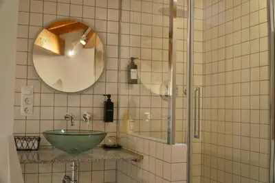 Un baño de A Bolota, Casa rural