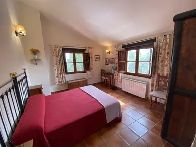 Cama o camas de una habitación en Apartamentos en finca privada