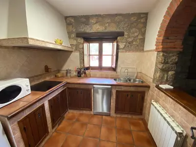Una cocina o zona de cocina en Apartamentos en finca privada
