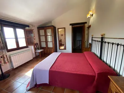 Cama o camas de una habitación en Apartamentos en finca privada