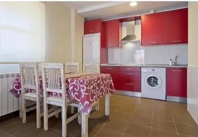Una cocina o zona de cocina en Apartamentos turísticos Sardon