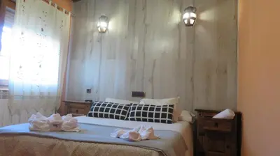 Cama o camas de una habitación en Hotel Rural Vistahermosa