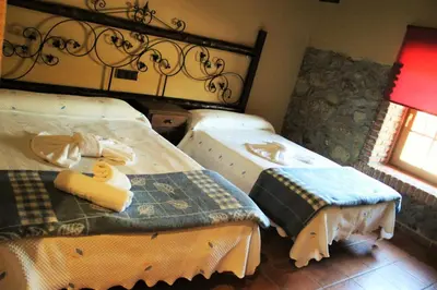 Cama o camas de una habitación en Hotel Rural Vistahermosa