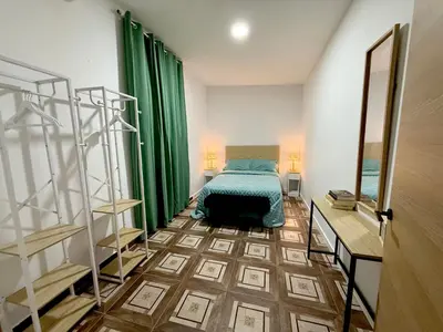 Cama o camas de una habitación en Casa Rural Madrigalejo