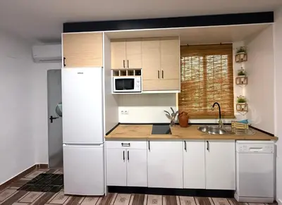 Una cocina o zona de cocina en Casa Rural Madrigalejo