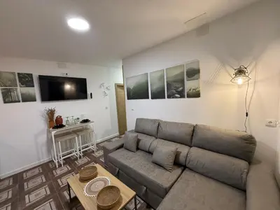 Una televisión o centro de entretenimiento en Casa Rural Madrigalejo