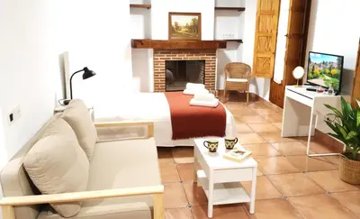 Zona de estar de Comfortable studio in San Pablo by beBalmy