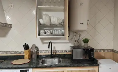 Una cocina o zona de cocina en Comfortable studio in San Pablo by beBalmy