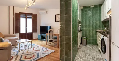 Una televisión o centro de entretenimiento en Amplio Apartamento Avenida Alfonso VIII Plasencia
