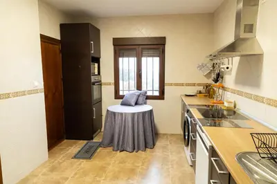 Una cocina o zona de cocina en El Cerro del Pinar