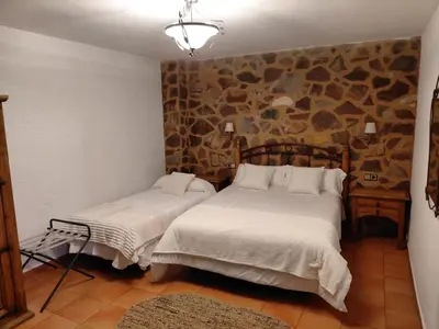 Cama o camas de una habitación en Hotel Rural La Posada de Lía