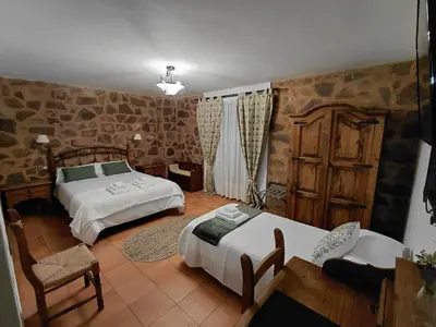 Cama o camas de una habitación en Hotel Rural La Posada de Lía
