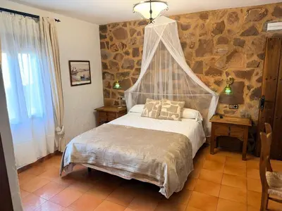 Cama o camas de una habitación en Hotel Rural La Posada de Lía