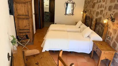 Cama o camas de una habitación en Hotel Rural La Posada de Lía