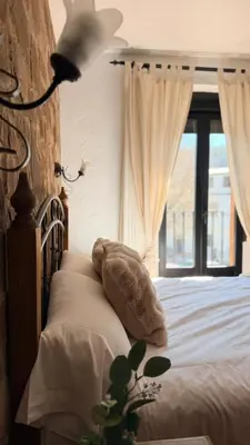 Cama o camas de una habitación en Hotel Rural La Posada de Lía