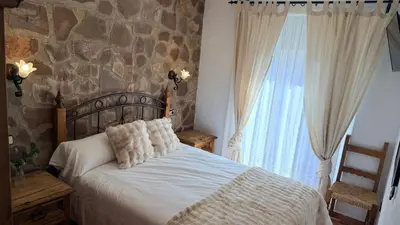 Cama o camas de una habitación en Hotel Rural La Posada de Lía