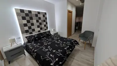 Cama o camas de una habitación en Duo Mendoza