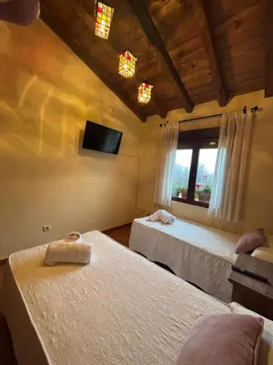 Cama o camas de una habitación en La Casa de La Grilla