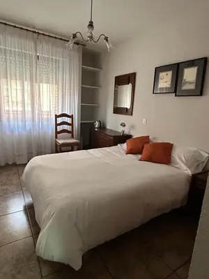 Cama o camas de una habitación en Palmera