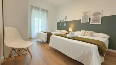 Cama o camas de una habitación en AT Macias Home centro Cáceres