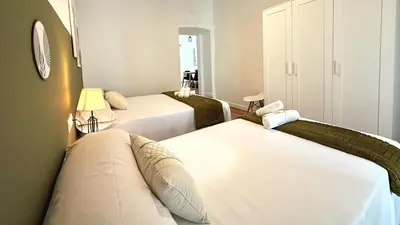 Cama o camas de una habitación en AT Macias Home centro Cáceres