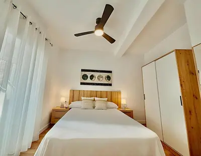 Cama o camas de una habitación en AT Macias Home centro Cáceres