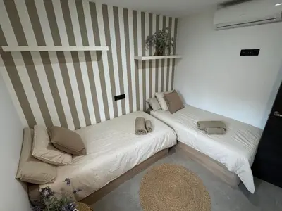 Cama o camas de una habitación en Luxury villa with pool, barbecue, stove, 3 bedrooms
