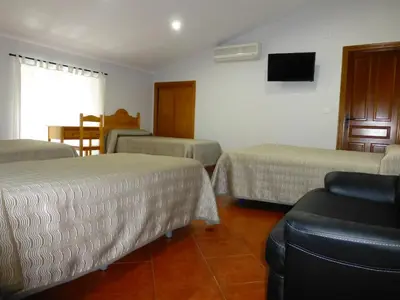 Cama o camas de una habitación en Hostal San Miguel