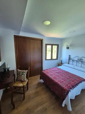 Cama o camas de una habitación en Apartamentos Rio Almar